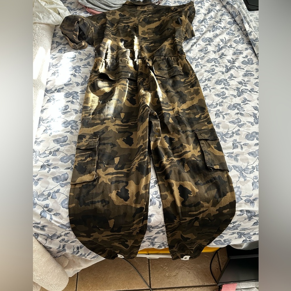 Im selling my brand new fashion nova cameo jumpsuit.’